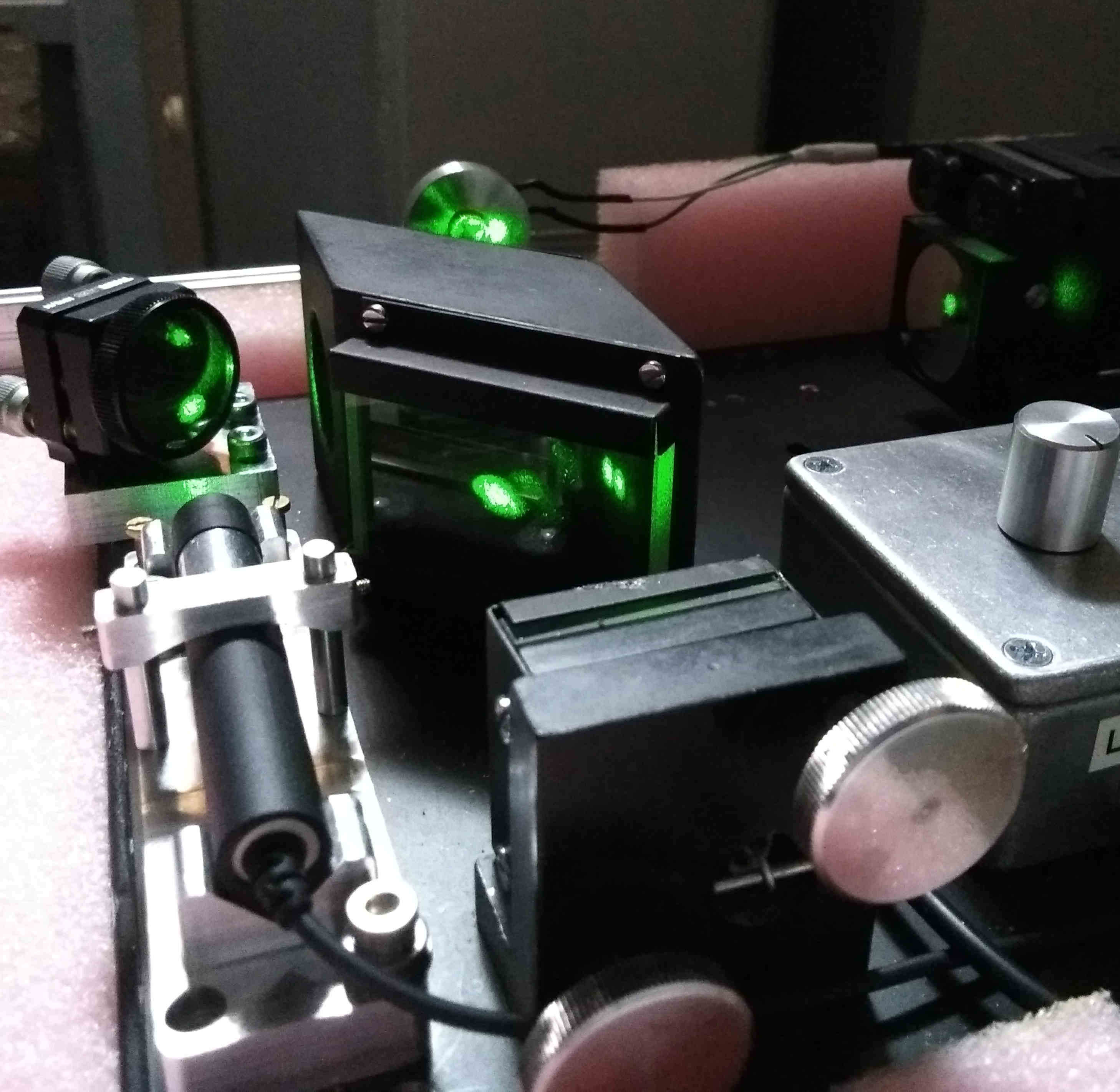Green laser michelson interferometer with audio synthesizer output